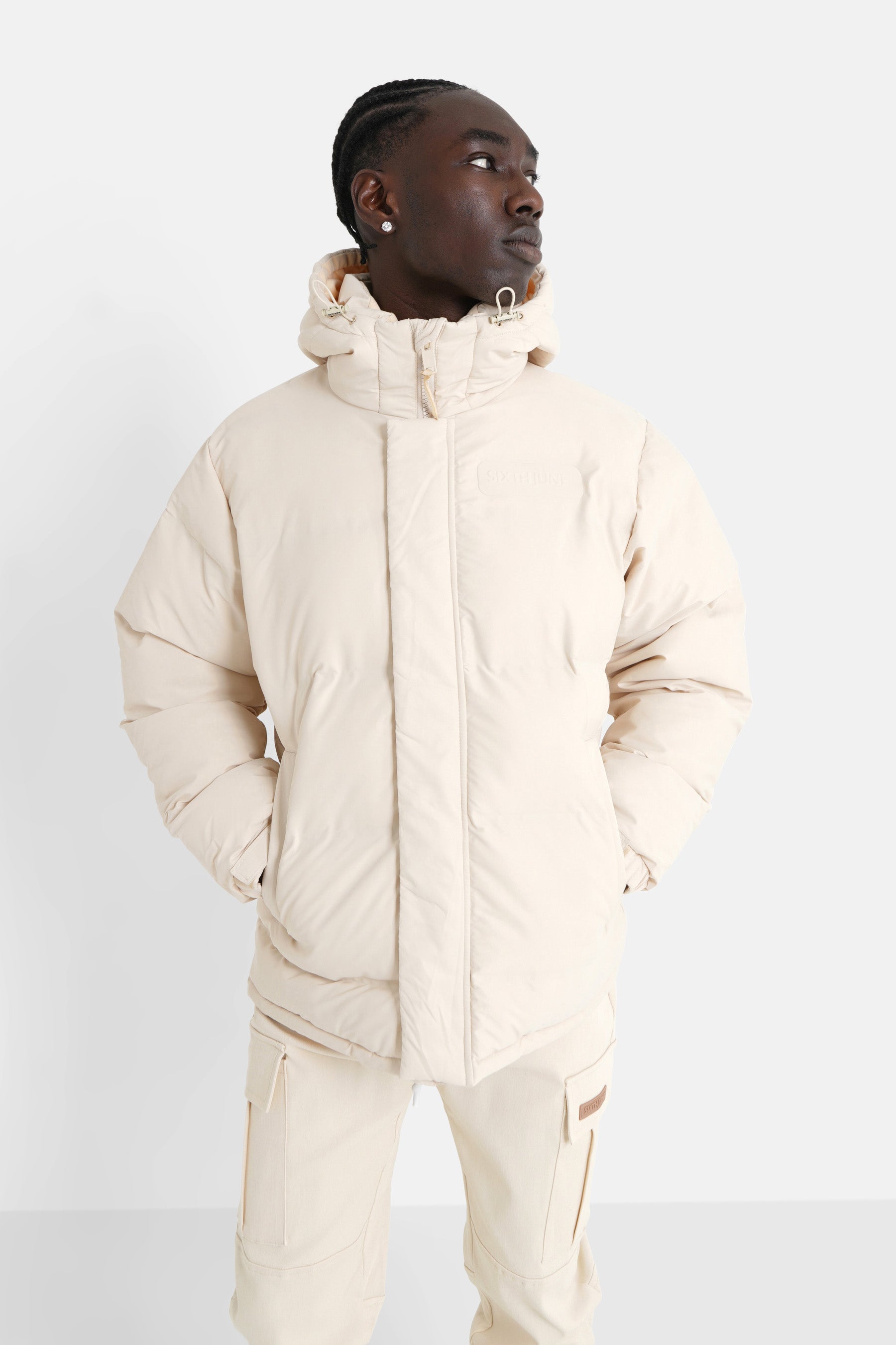 Seamless embossed down jacket Beige