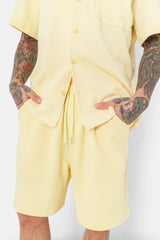 Textured embroidered cords shorts Yellow