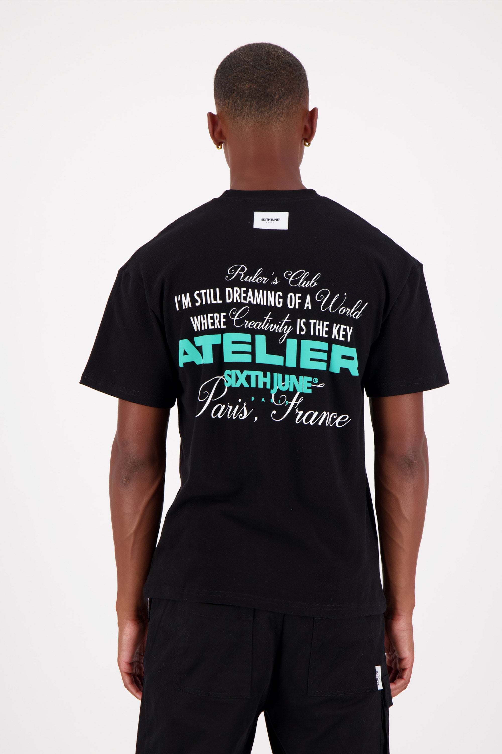 Schwarzes T-Shirt mit Workshop-Textdruck